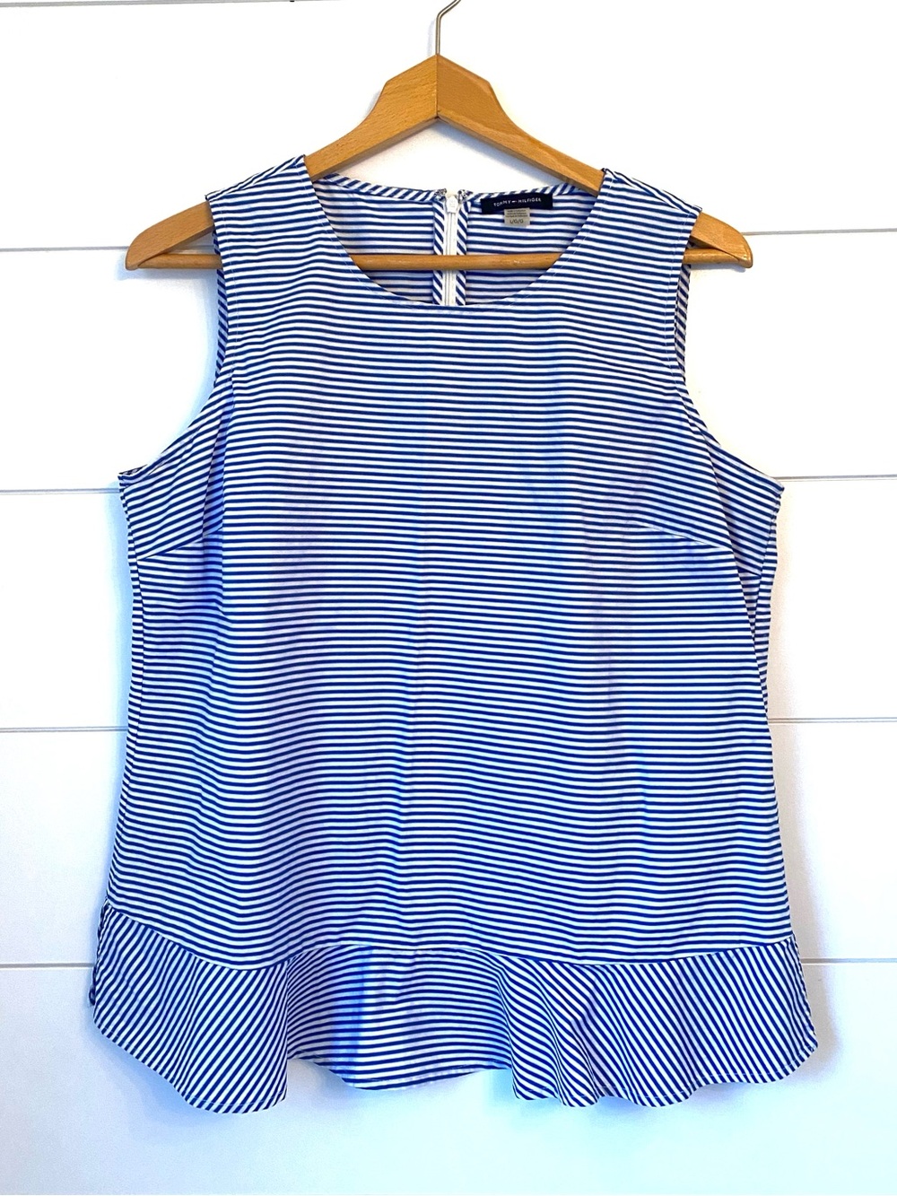 Tommy Hilfiger Sleeveless Blue and White Striped Peplum Top. (Size large)